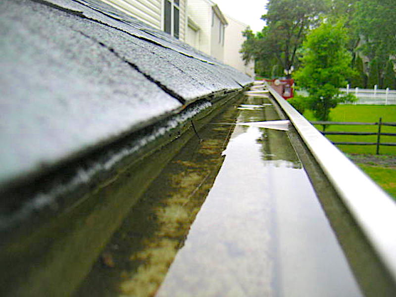 Tip #9: Gutters and Downspouts Inspection—Say Goodbye to Water Damage!